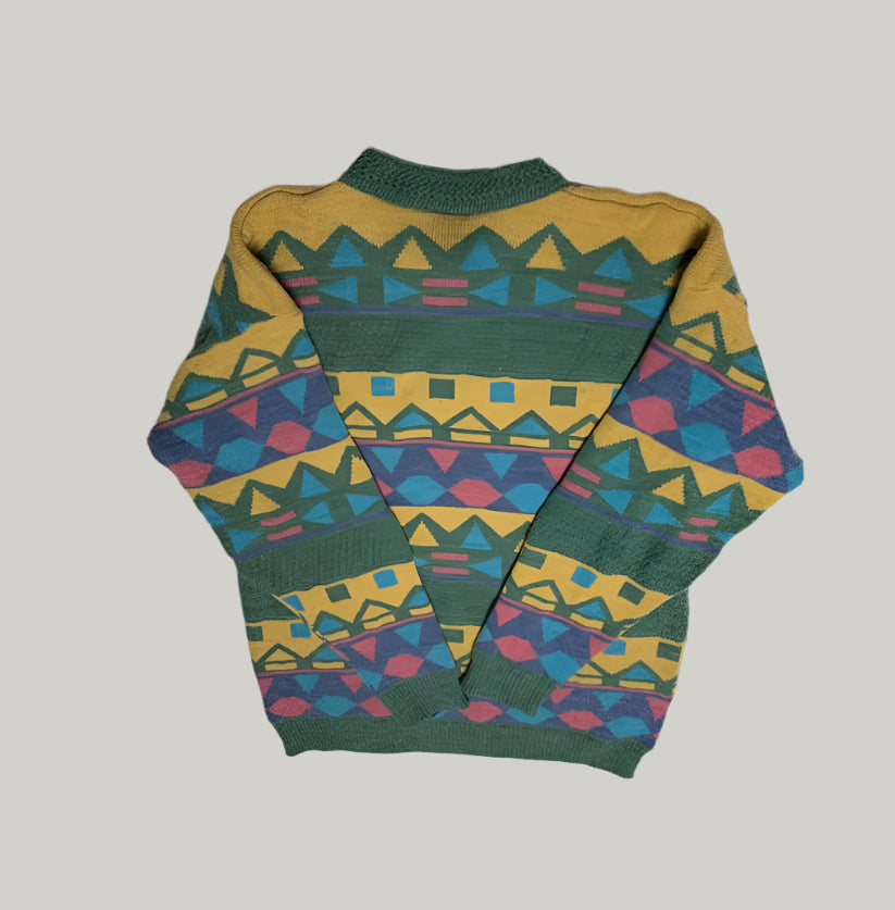 Colorful patterned sweater on a white background