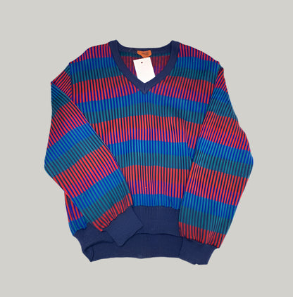 Multicolored striped sweater on a plain background