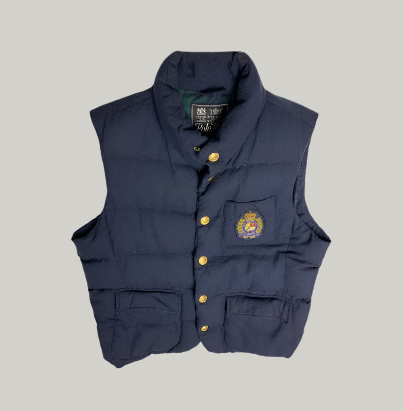 Navy blue vest with a logo on a light gray background