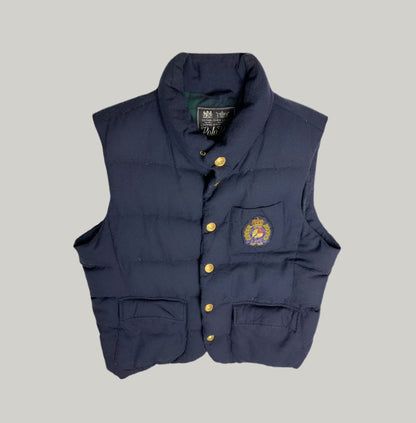Navy blue vest with a logo on a light gray background