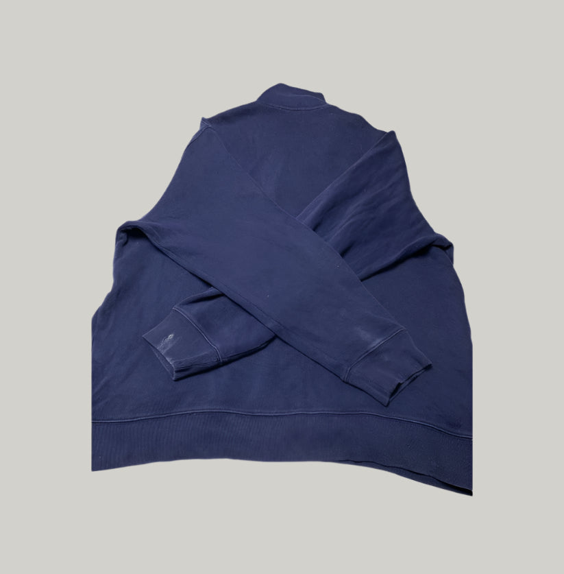 Blue sweatshirt on a light gray background