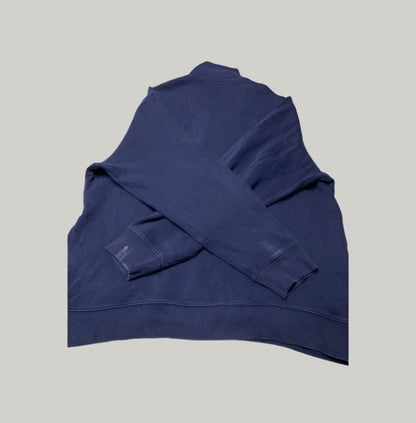 Blue sweatshirt on a light gray background