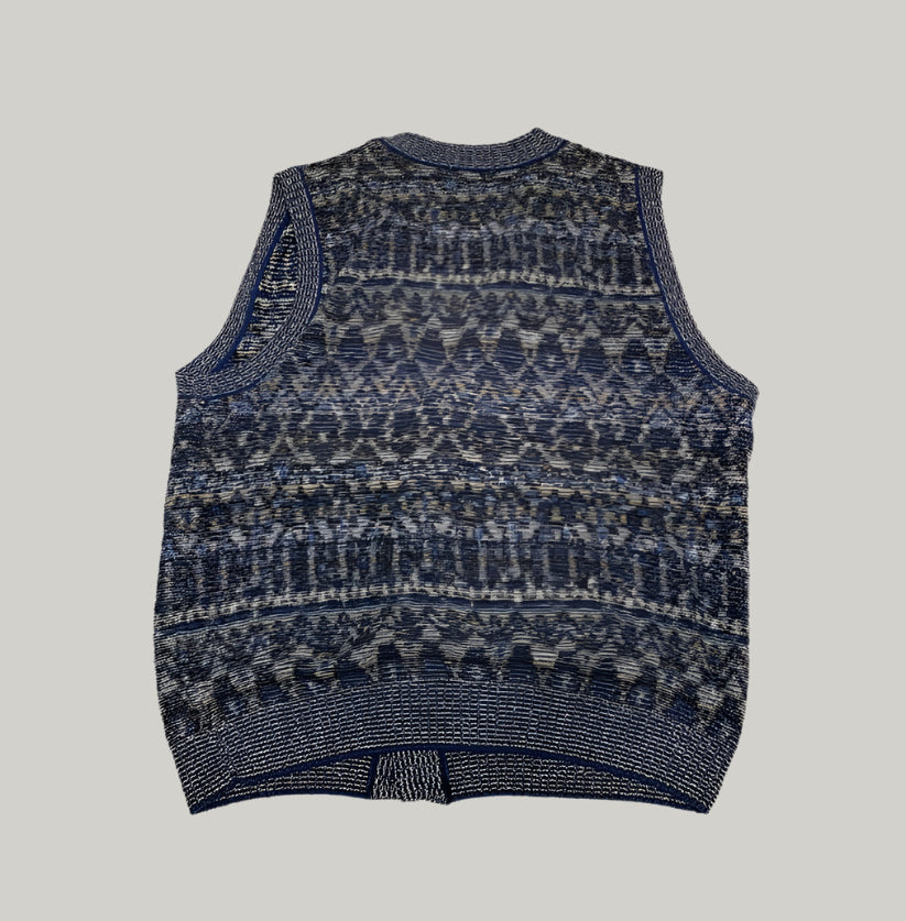 Patterned sleeveless sweater vest on a light background