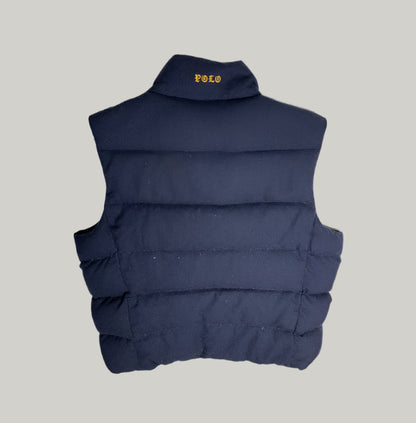 Navy blue puffer vest with Polo logo on a light gray background