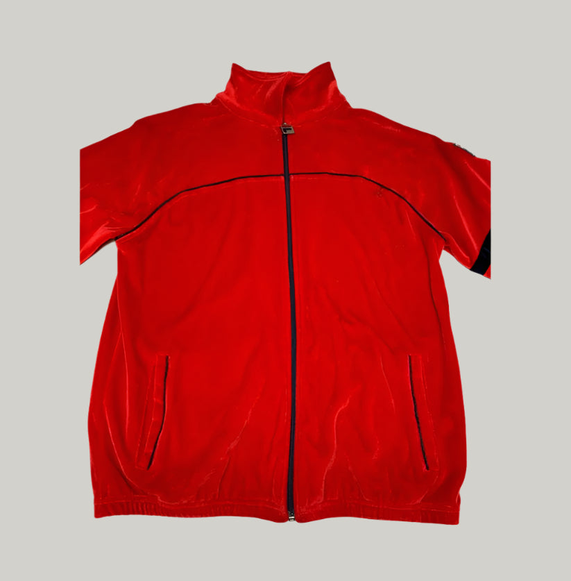 Red jacket with black accents on a light gray background