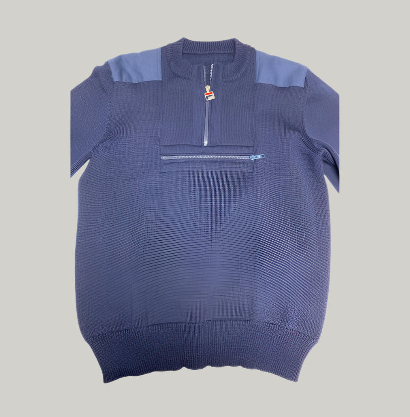 Blue sweater with a zipper on a light gray background