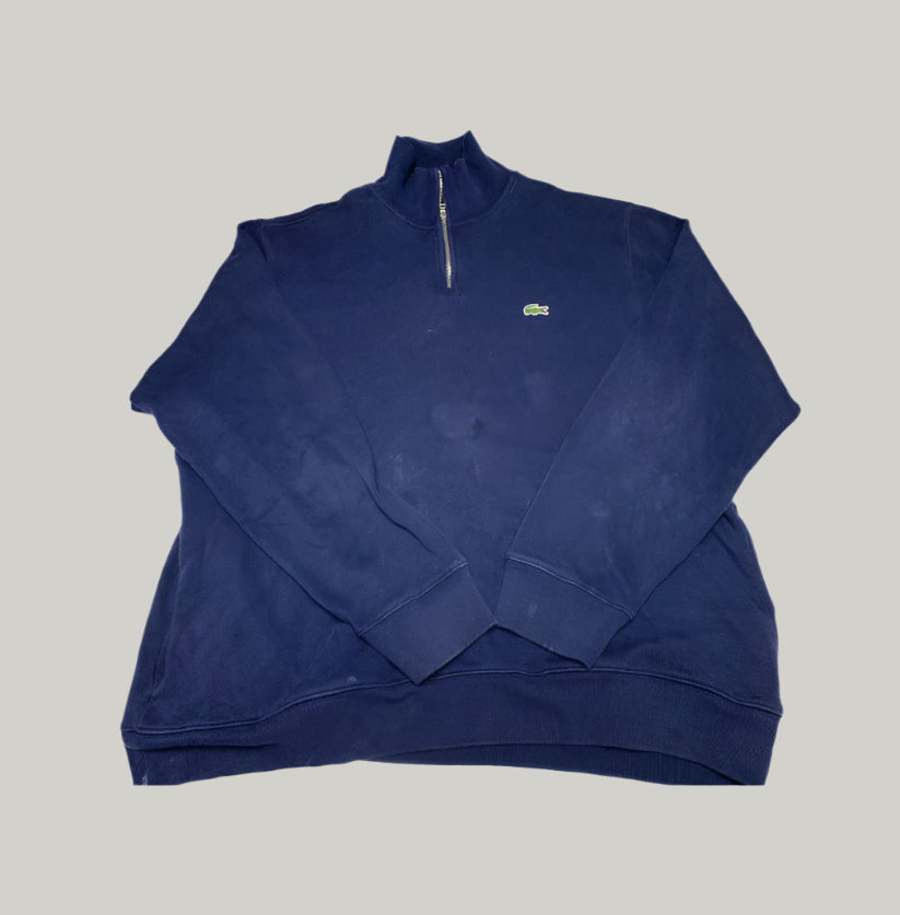 Blue sweatshirt with a brand logo on a light gray background