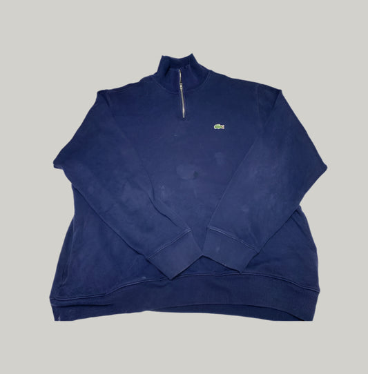 Blue sweatshirt with a brand logo on a light gray background