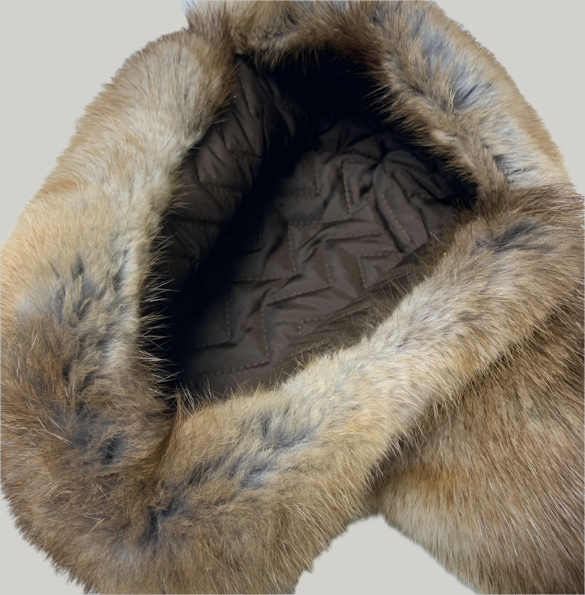 Close-up of a fur-lined hood on a white background